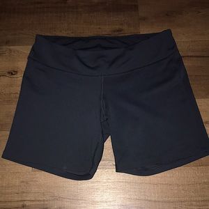 All black New Balance biker shorts